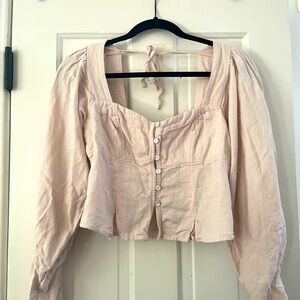 Light pink bustier puff sleeve crop top